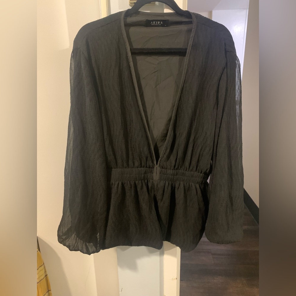 Black blouse or easily a light jacket.